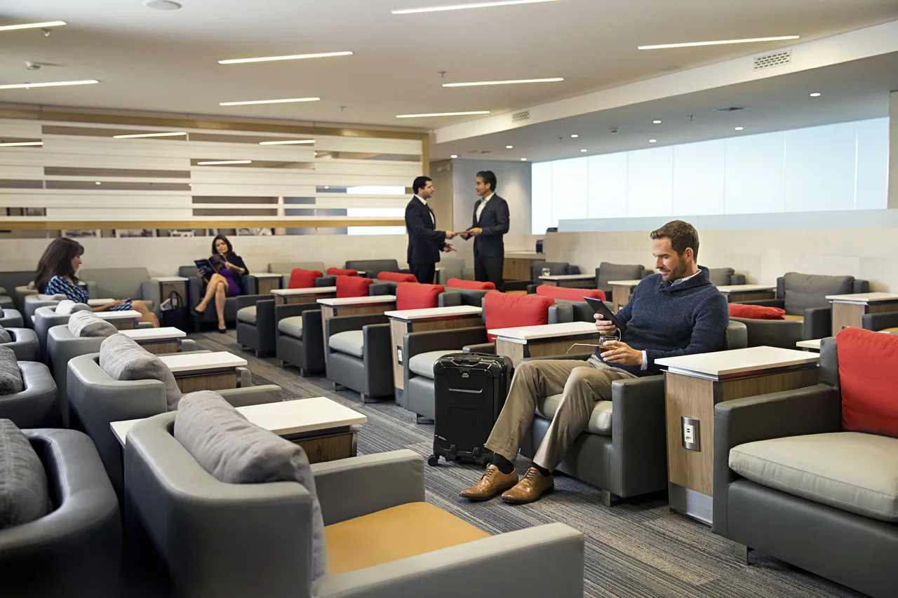 Admirals Club seating area, the lounge access typically unlocked by a successful status match.