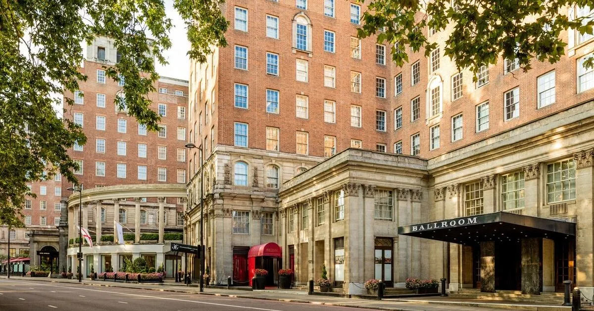 Heritage London hotel exterior on a bright morning, representative travel-photography image for an article on transferring credit card points to airline and hotel loyalty programmes.